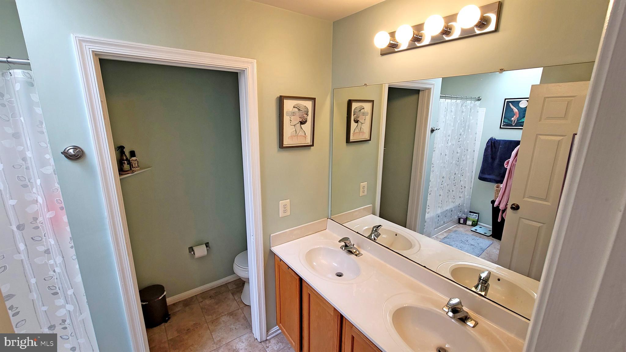732 Howards Loop Annapolis, MD 21401 - Photo 14 of 26 Double vanities in the owner's bath