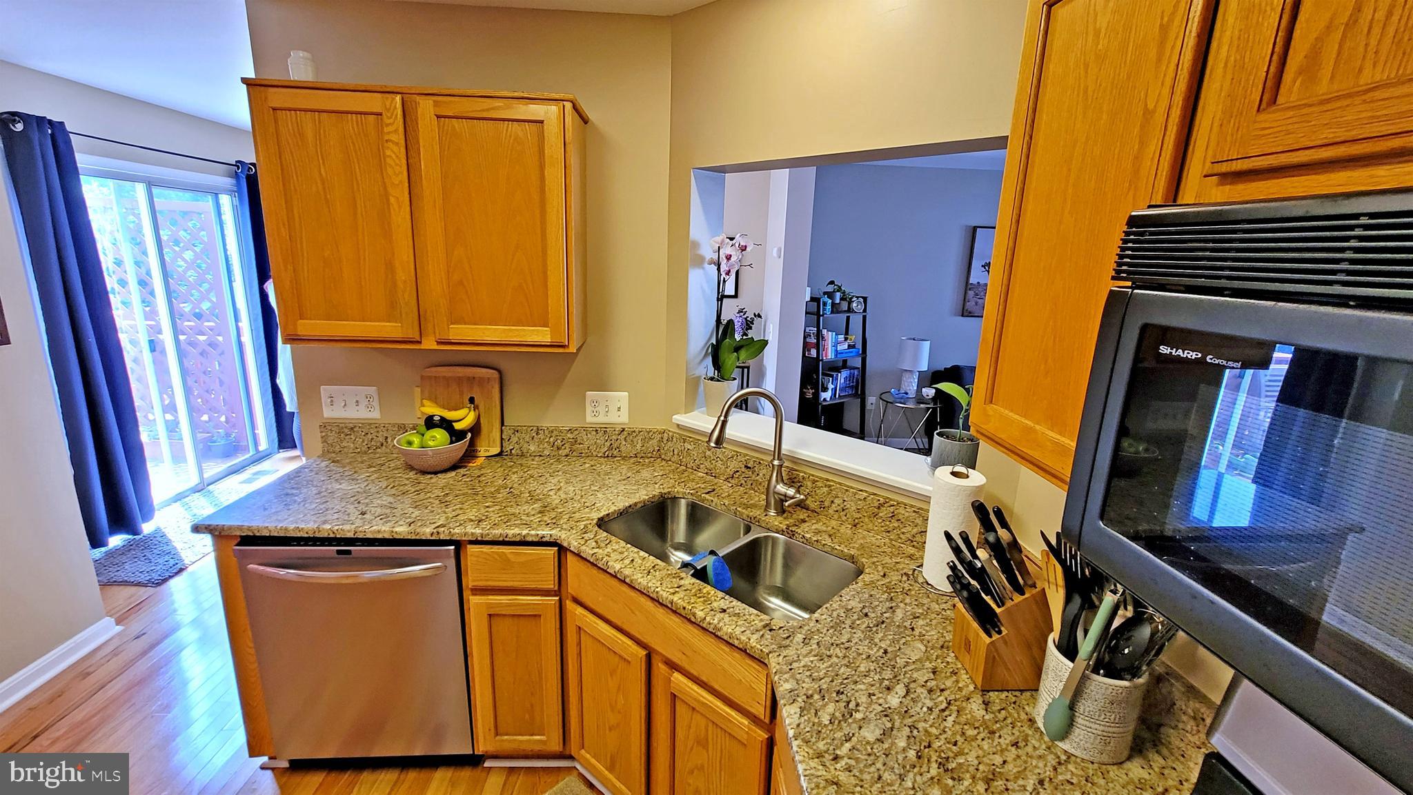 732 Howards Loop Annapolis, MD 21401 - Photo 8 of 26 Granite and stainless in the kitchen