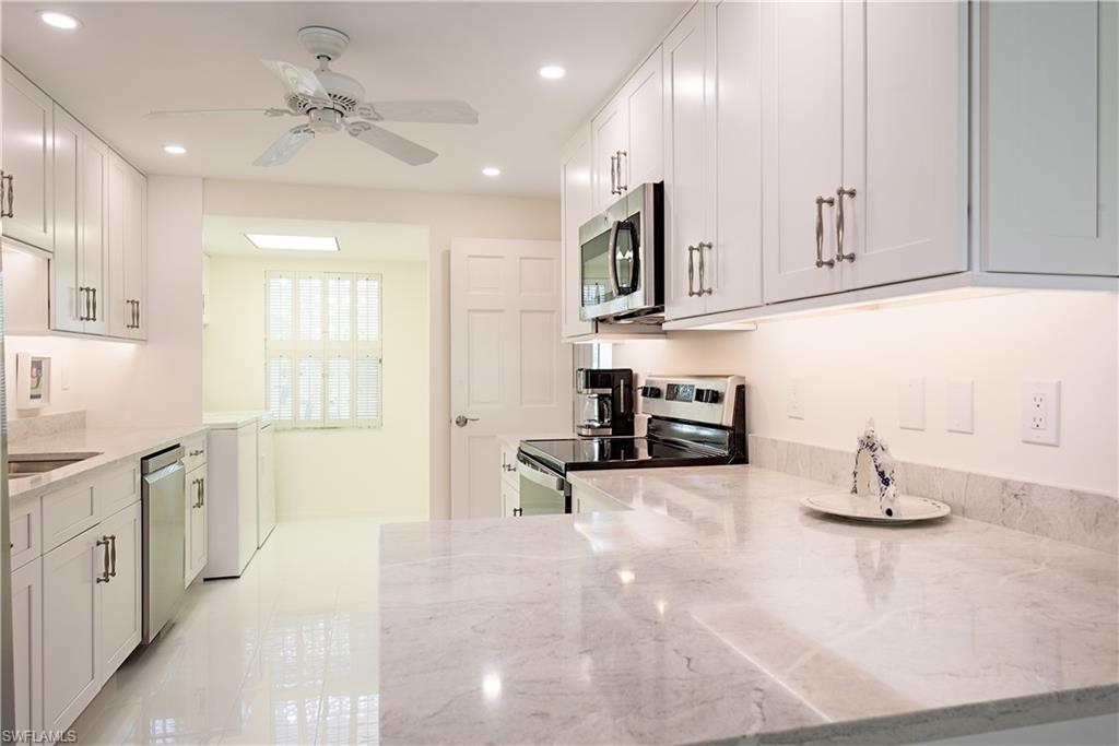 4155 Crayton Road, Unit 109 Naples, FL 34103 - Photo 1 of 21 New kitchen with quartz countertops