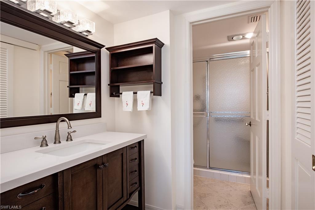 4155 Crayton Road, Unit 109 Naples, FL 34103 - Photo 11 of 21 Guest bathroom