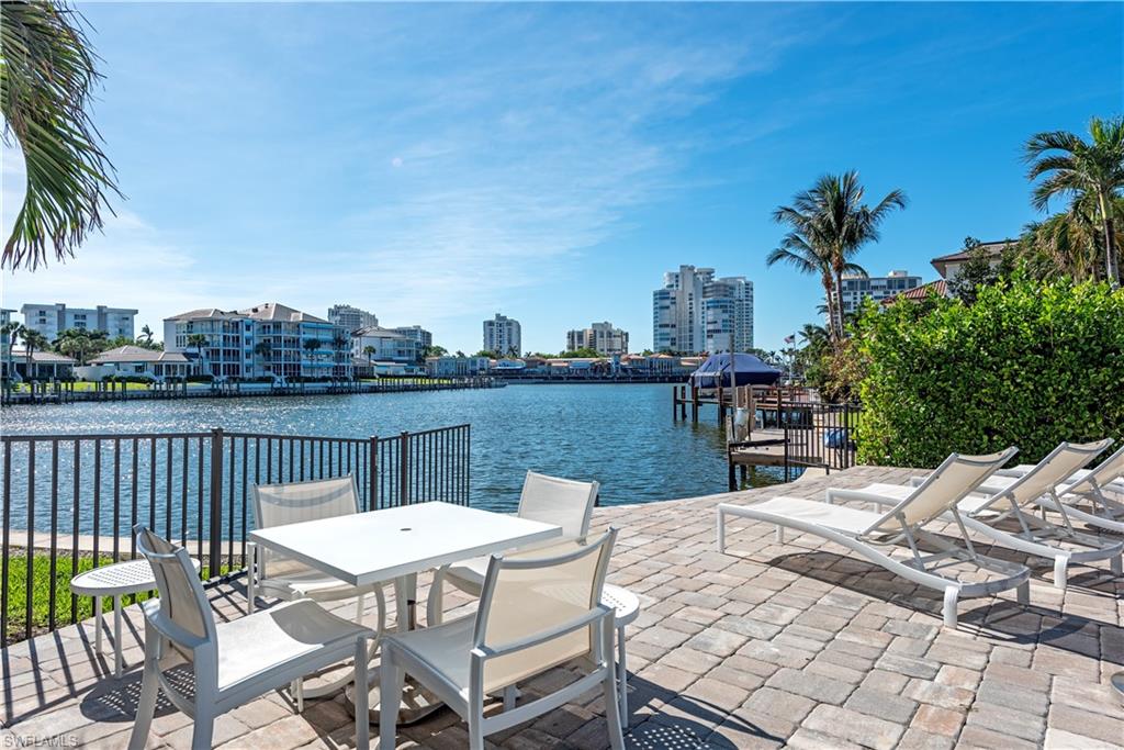 4155 Crayton Road, Unit 109 Naples, FL 34103 - Photo 17 of 21 View of patio / terrace with a water view