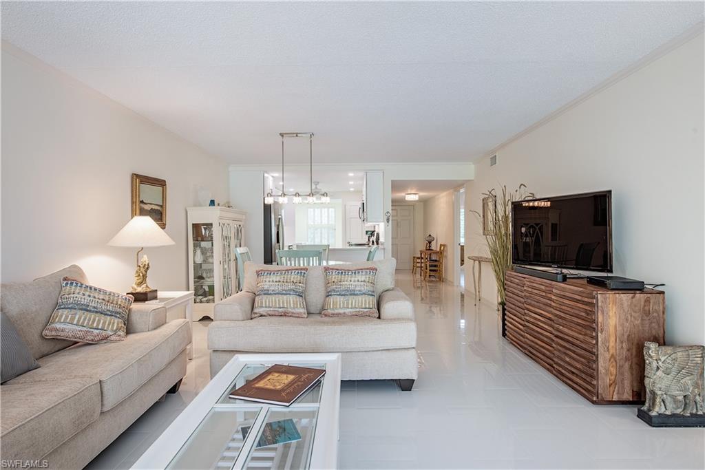 4155 Crayton Road, Unit 109 Naples, FL 34103 - Photo 4 of 21 Spacious and bright living room