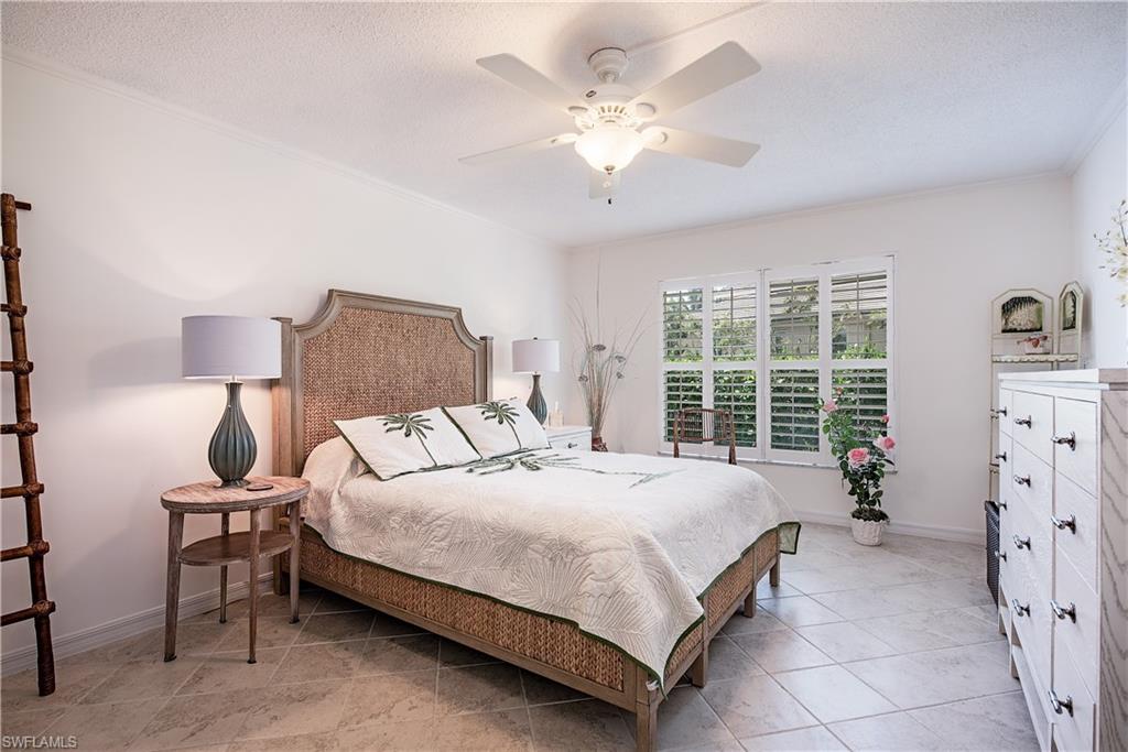 4155 Crayton Road, Unit 109 Naples, FL 34103 - Photo 8 of 21 Large master bedroom
