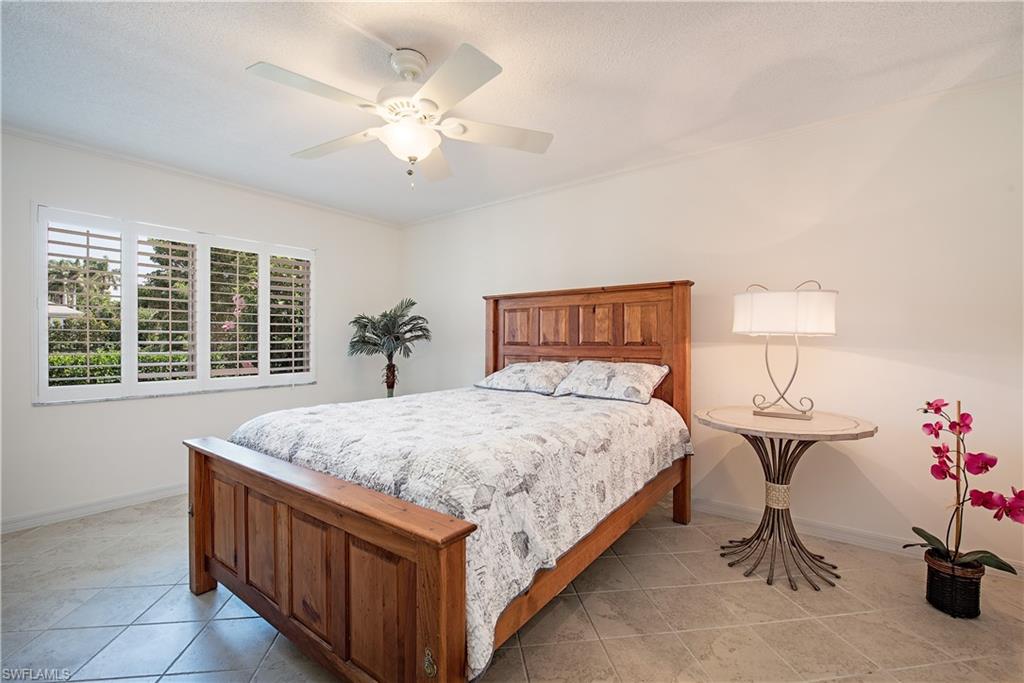 4155 Crayton Road, Unit 109 Naples, FL 34103 - Photo 10 of 21 Spacious guest bedroom