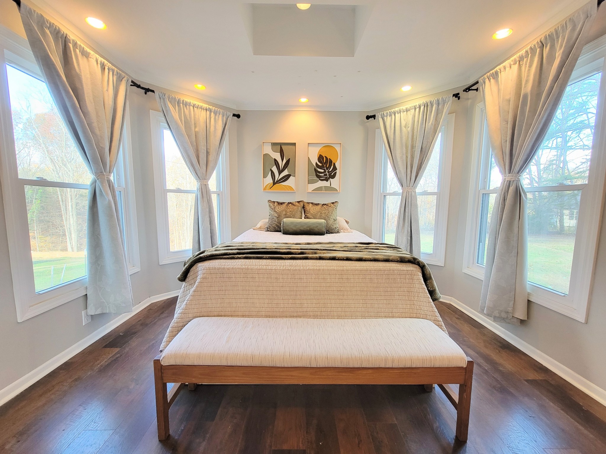 185 B Y Brown Road Charlotte, TN 37036 - Photo 21 of 52 a bedroom with a large bed and a large window