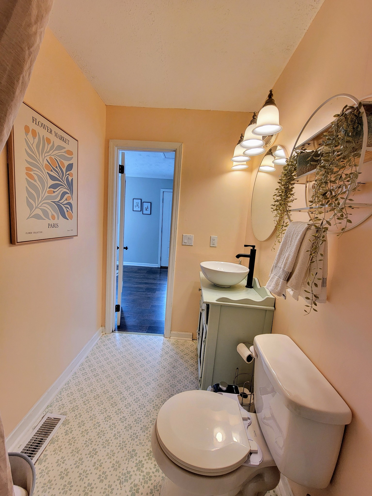 185 B Y Brown Road Charlotte, TN 37036 - Photo 25 of 52 a bathroom with a toilet a sink and mirror