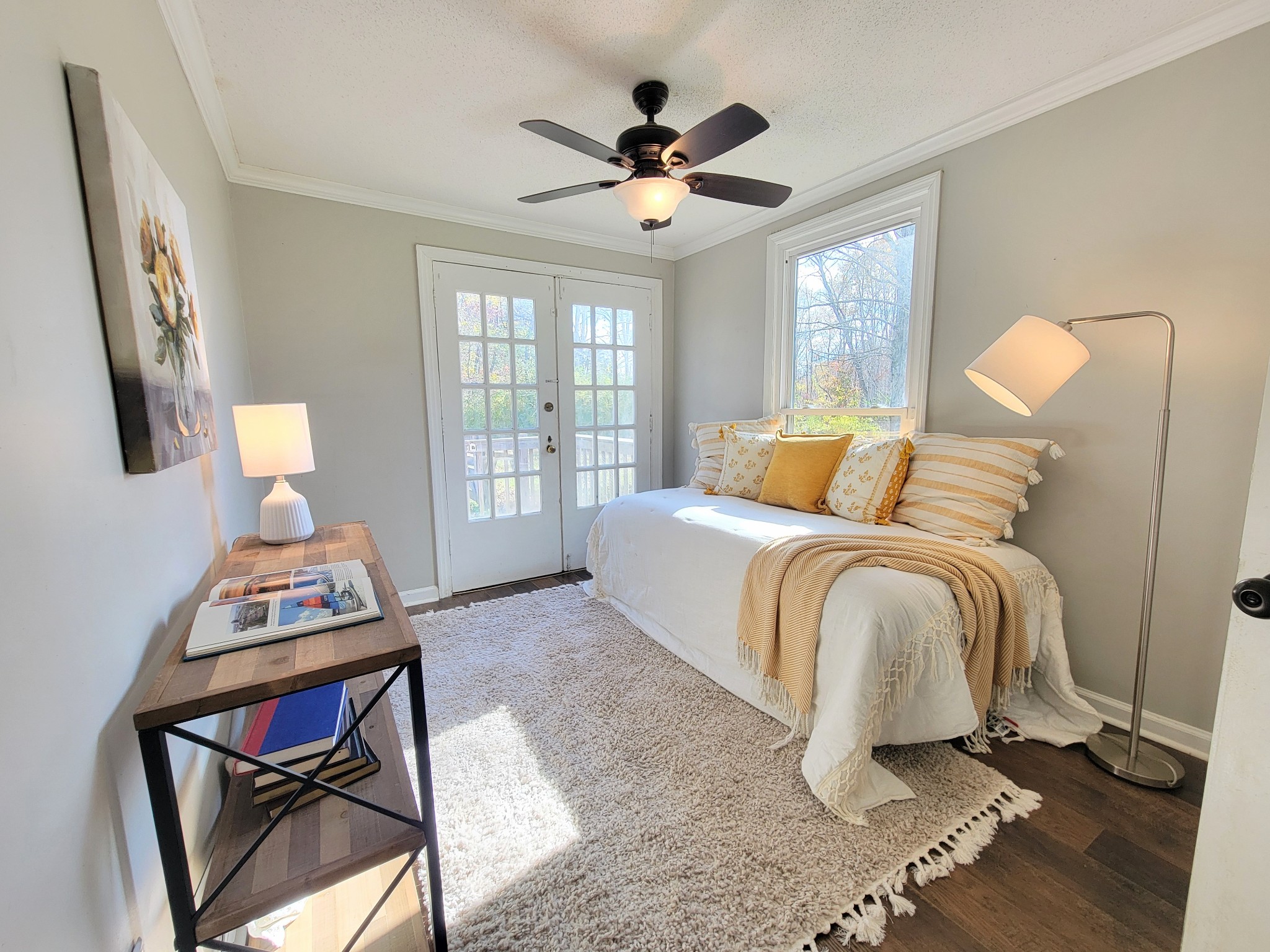 185 B Y Brown Road Charlotte, TN 37036 - Photo 33 of 52 a bedroom with a bed and wooden floor