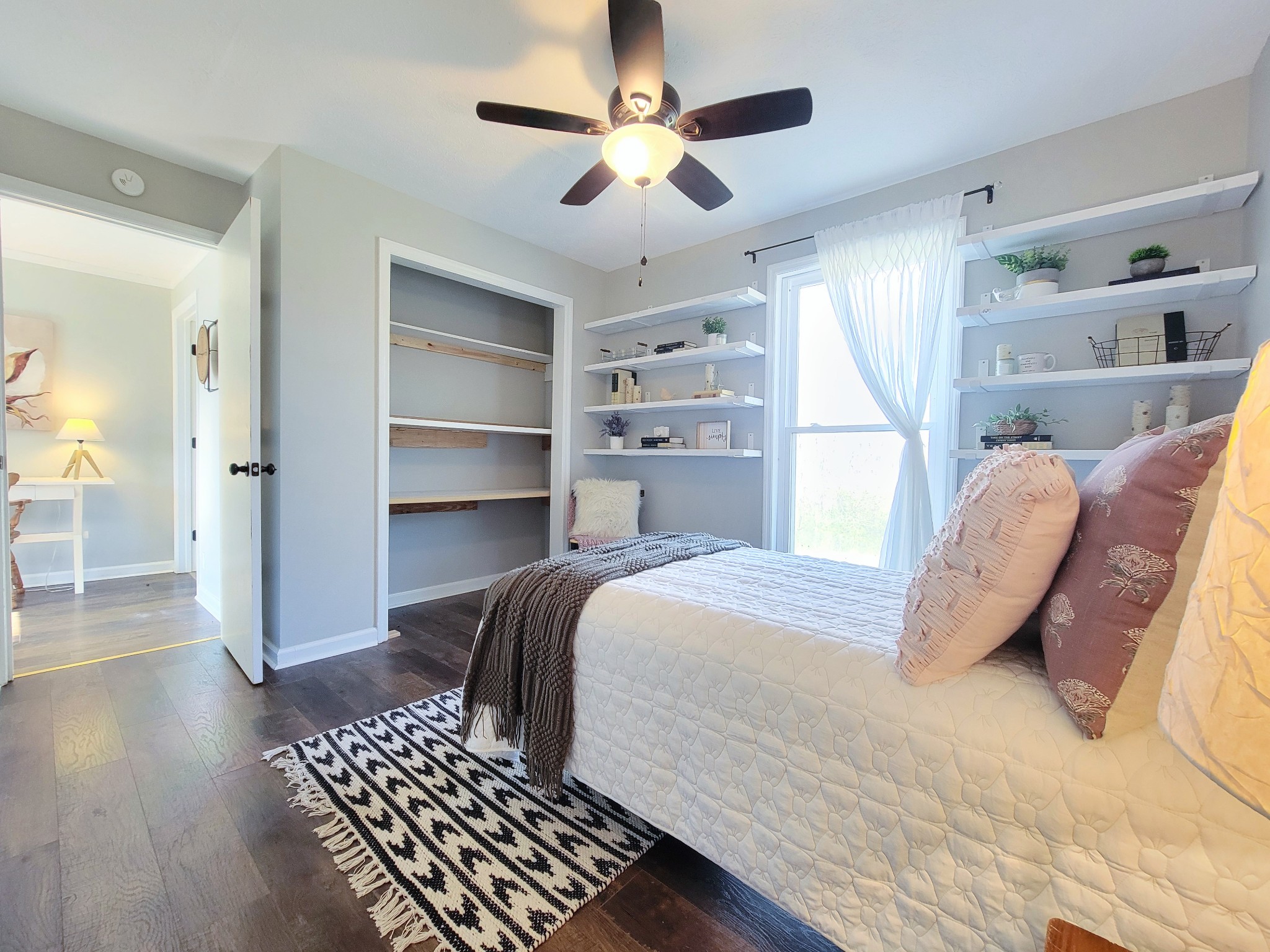 185 B Y Brown Road Charlotte, TN 37036 - Photo 37 of 52 a bedroom with a bed and a walk in closet