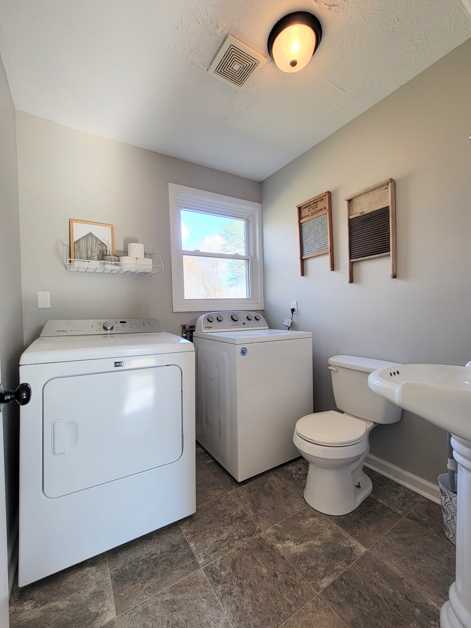185 B Y Brown Road Charlotte, TN 37036 - Photo 41 of 52 a bathroom with a toilet sink and mirror