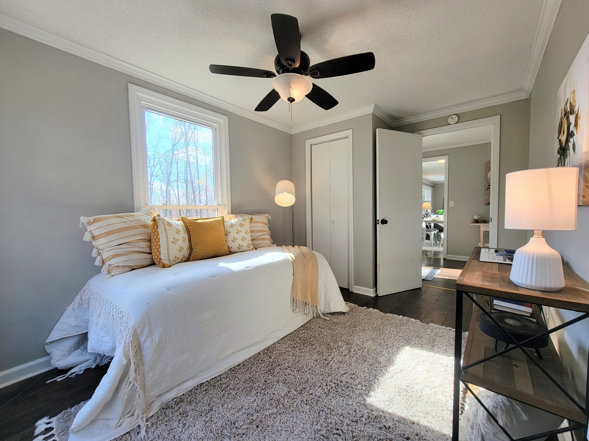 185 B Y Brown Road Charlotte, TN 37036 - Photo 42 of 52 a bedroom with a bed and a chandelier