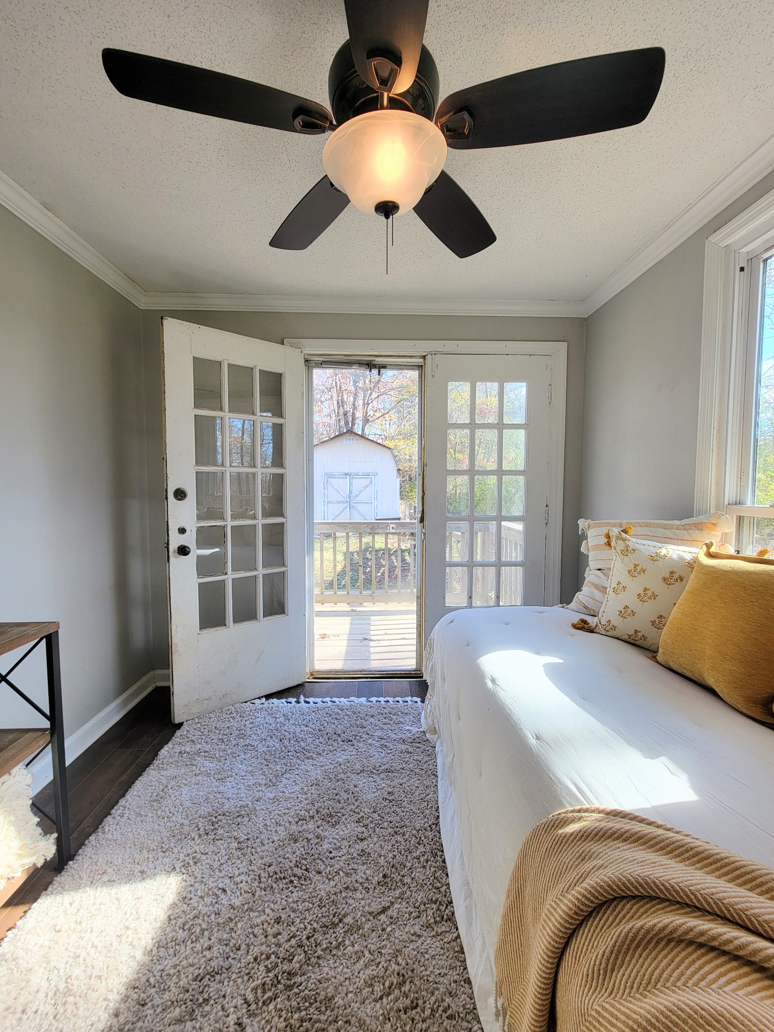 185 B Y Brown Road Charlotte, TN 37036 - Photo 43 of 52 a bedroom with a large bed and a large window