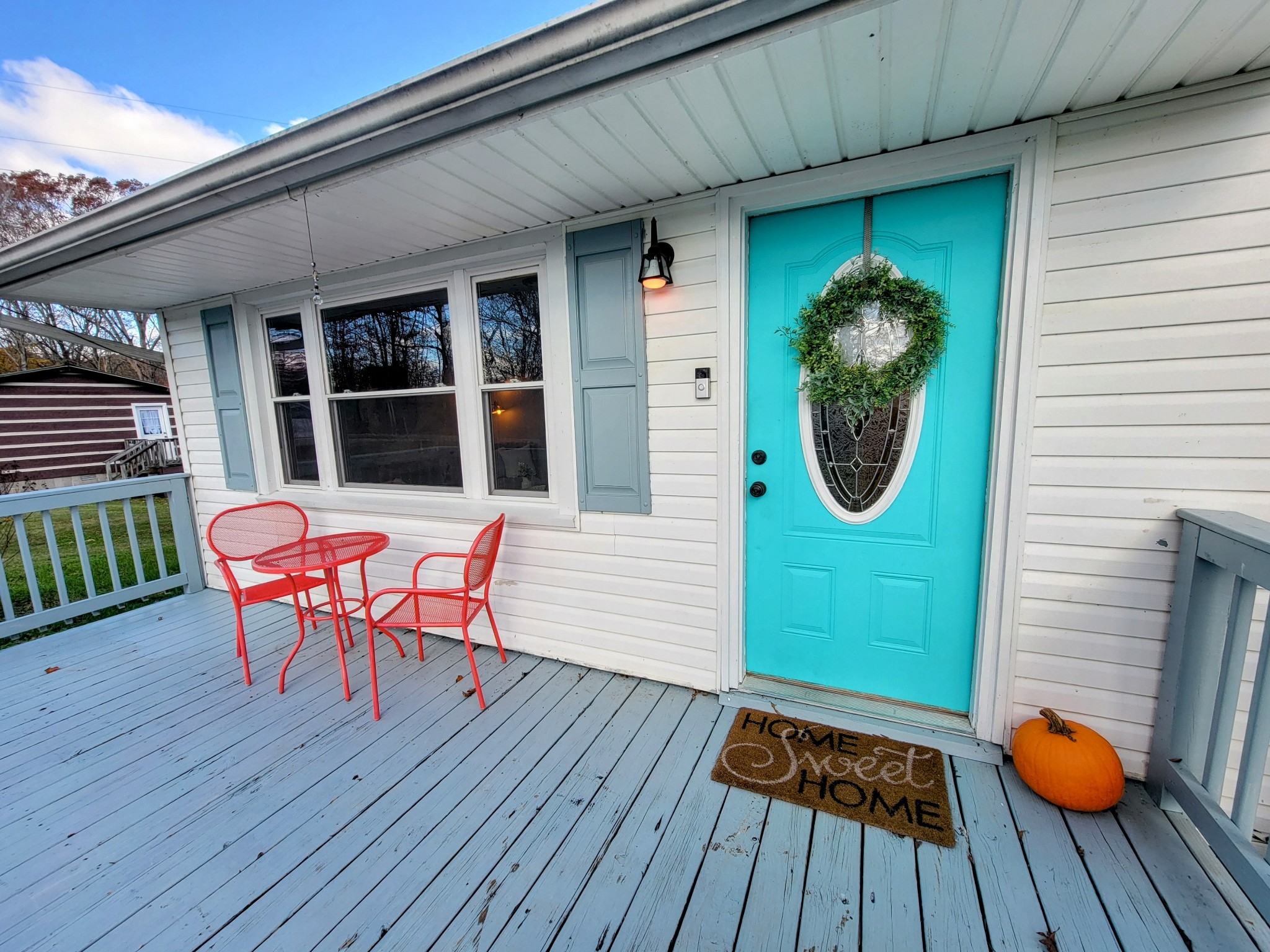 185 B Y Brown Road Charlotte, TN 37036 - Photo 6 of 52 a backyard of a house with wooden floor chairs and outdoor seating