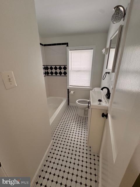 1090 Cameron Road Baltimore, MD 21212 - Photo 13 of 19 a bathroom with a sink a toilet a window and shower
