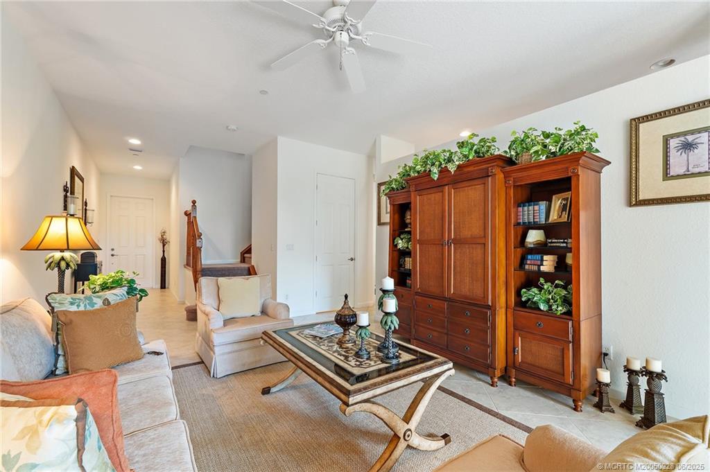 170 Southwest Walking Path Stuart, FL 34997 - Photo 4 of 18 a living room with furniture and wooden floor