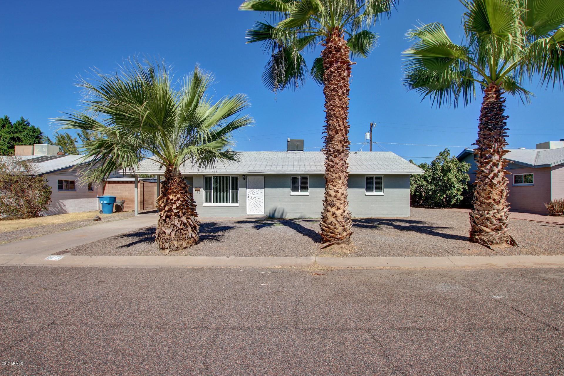 4844 East Coronado Road Phoenix, AZ 85008 - Photo 1 of 26 a view of a house with outdoor space and palm trees