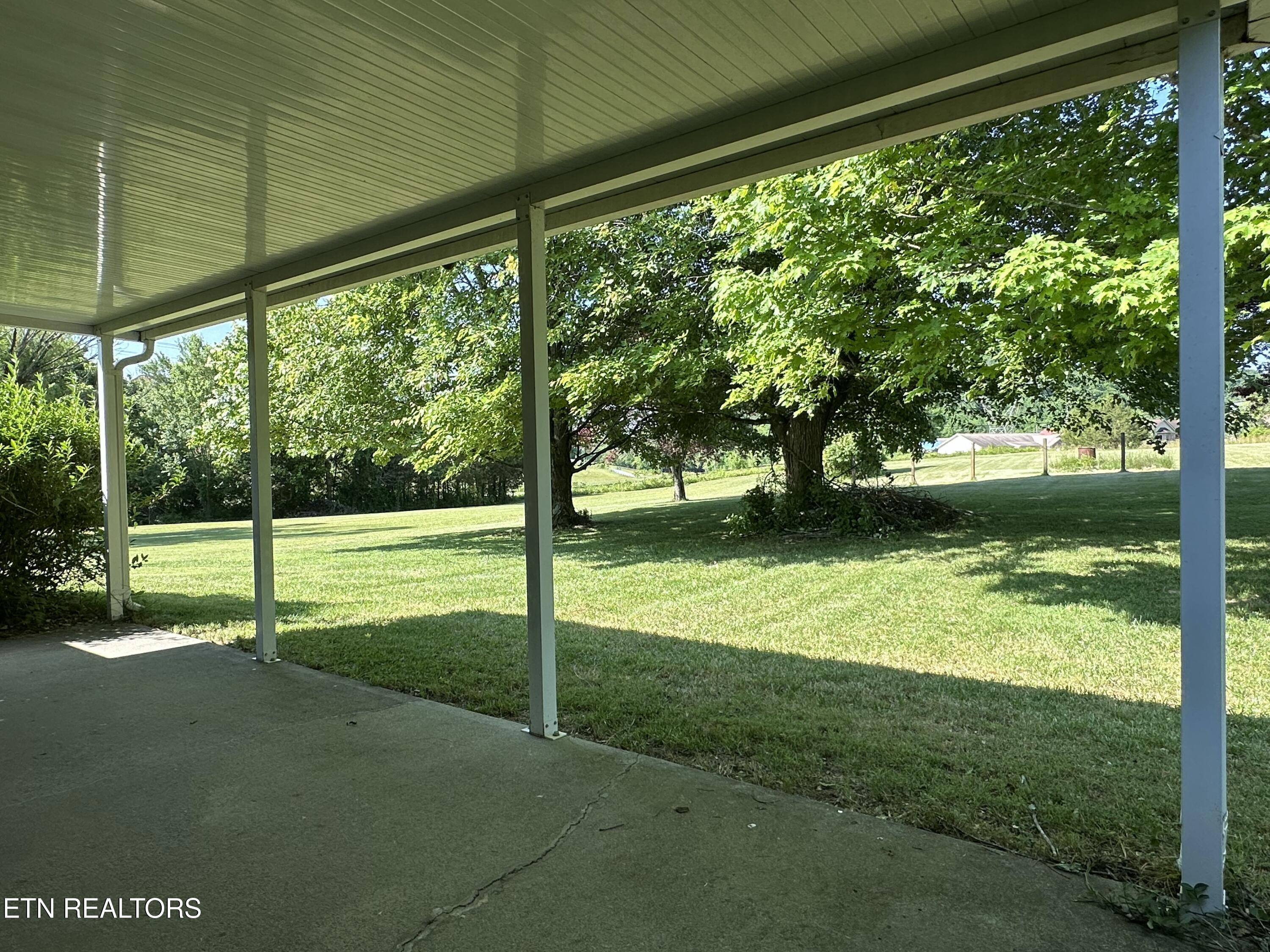7021 Pisa Circle Corryton, TN 37721 - Photo 23 of 32 Porch to Backyard 03