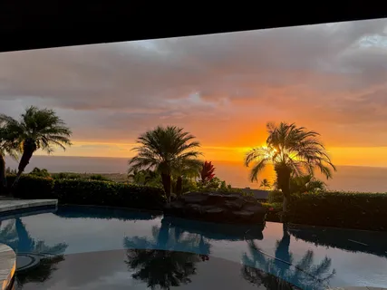 a terrace of a house with outdoor seating