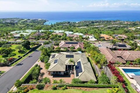 an aerial view of a house with a garden