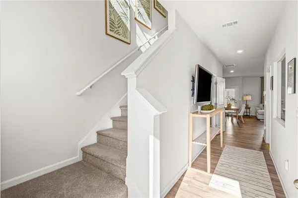 a view of dining room with wooden floor