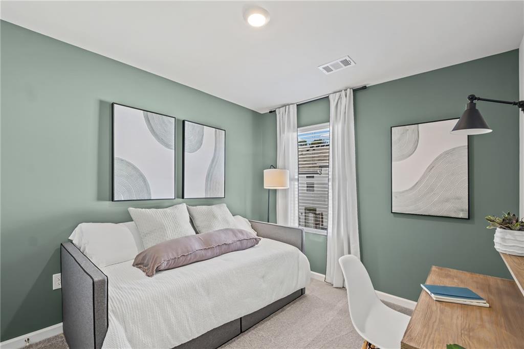 7 Silverbell Lane Northwest Rome, GA 30165 - Photo 20 of 24 a bedroom with a bed and a window