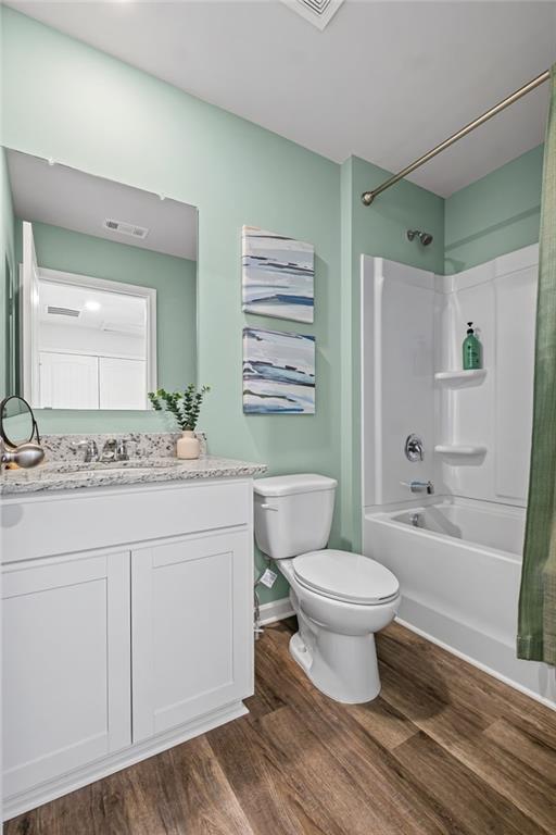7 Silverbell Lane Northwest Rome, GA 30165 - Photo 22 of 24 a bathroom with a sink toilet a mirror and shower