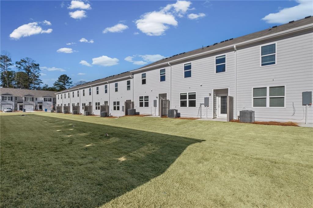 7 Silverbell Lane Northwest Rome, GA 30165 - Photo 24 of 24 a view of a house with backyard and porch
