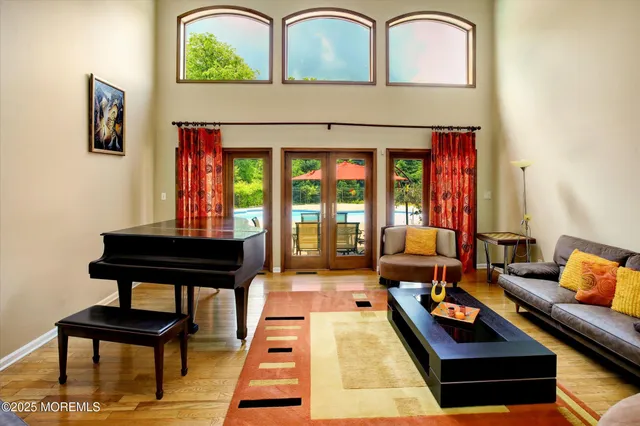 a view of a balcony with two chairs and a table