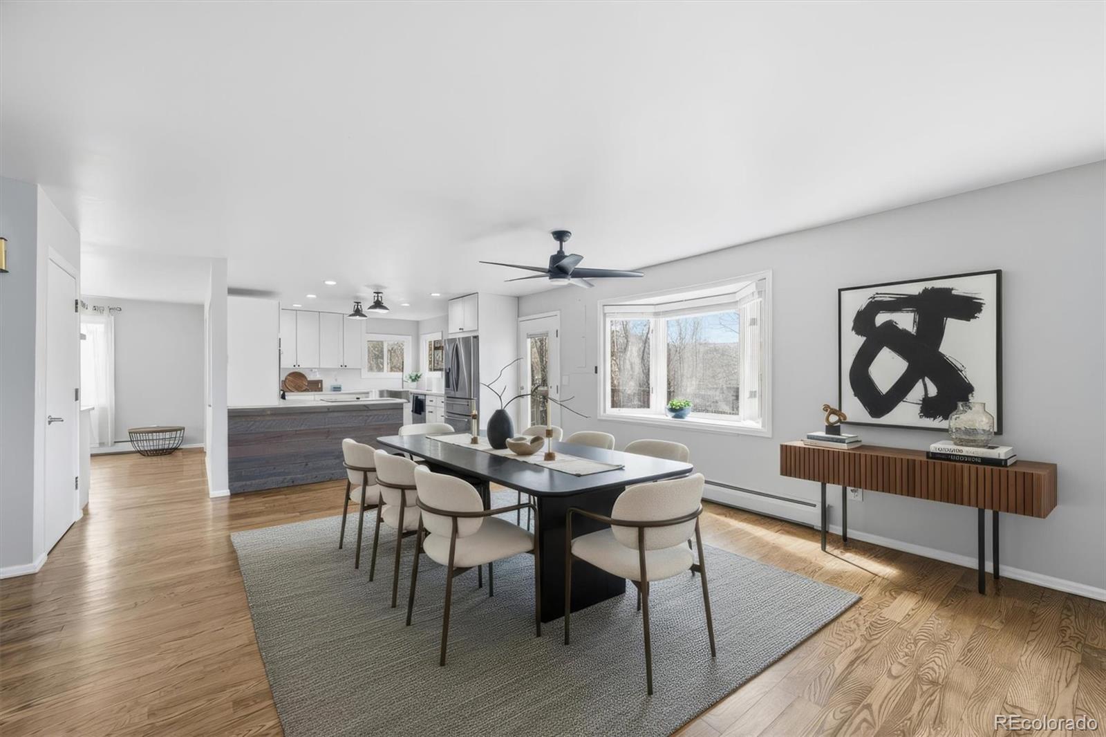 767 Ellis Street Golden, CO 80401 - Photo 17 of 50 a view of a a dining room with furniture window and wooden floor