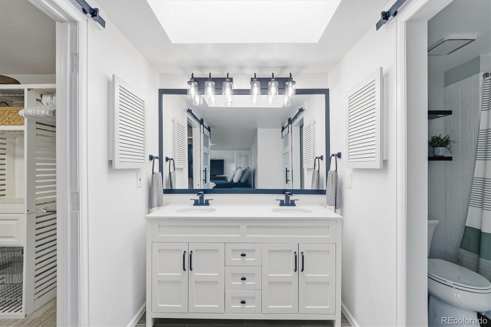 767 Ellis Street Golden, CO 80401 - Photo 27 of 50 a bathroom with a sink and a mirror