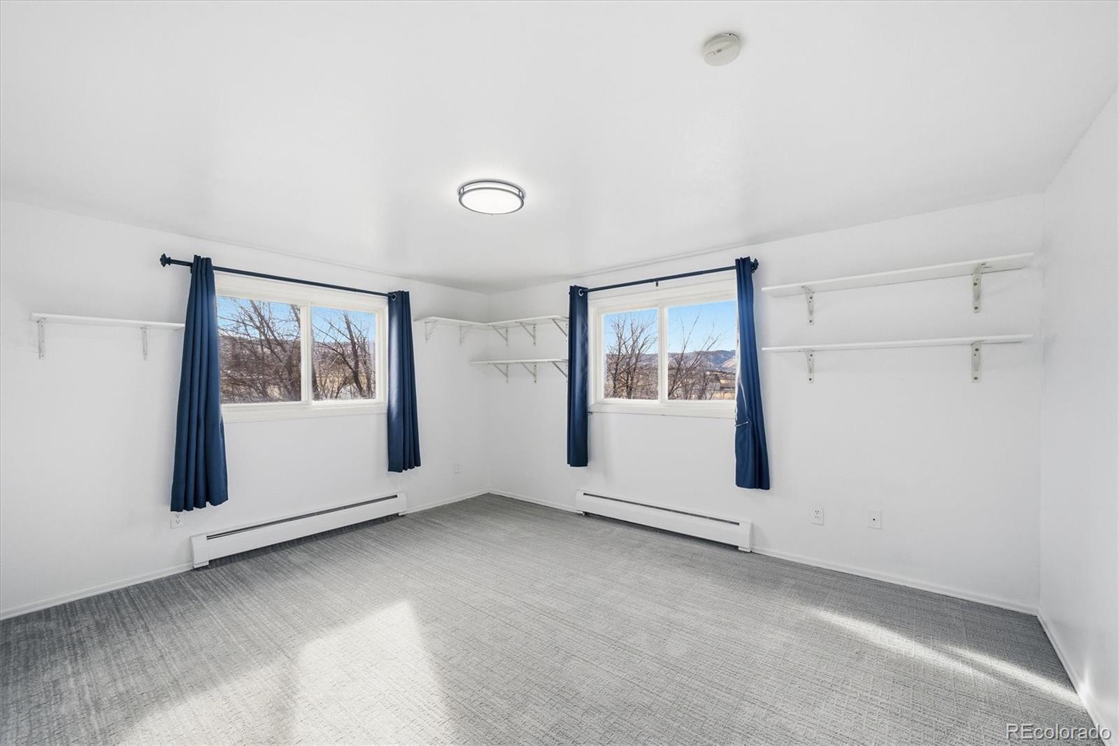 767 Ellis Street Golden, CO 80401 - Photo 29 of 50 a view of an empty room with window