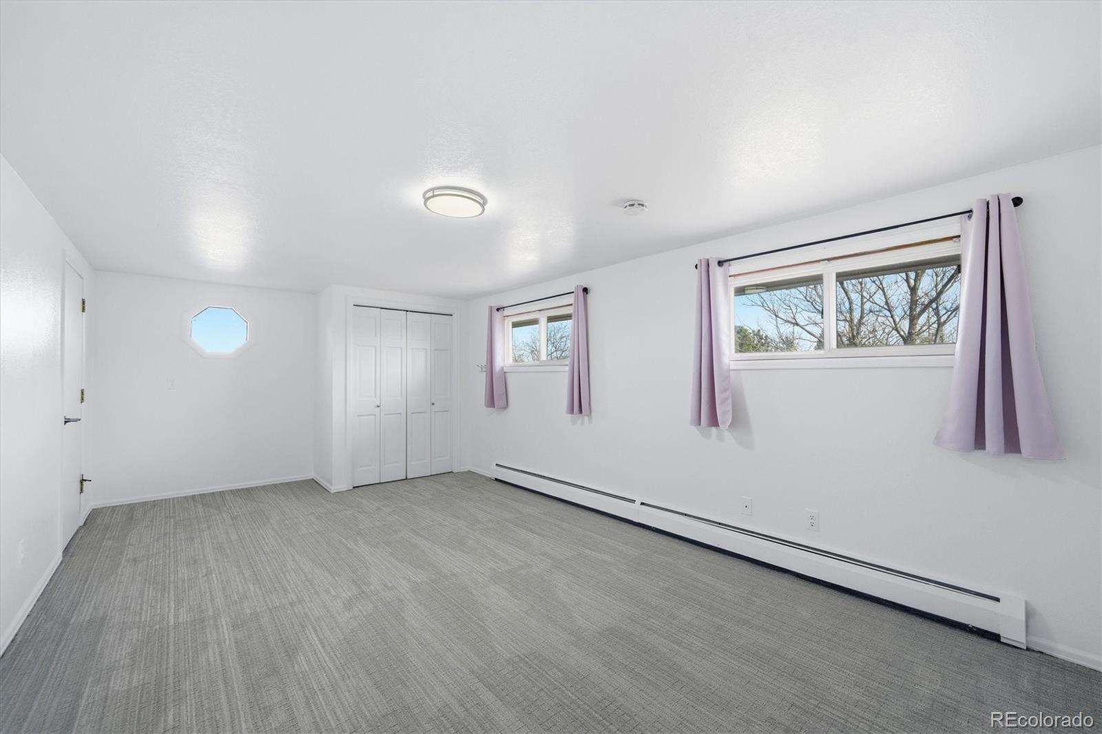 767 Ellis Street Golden, CO 80401 - Photo 32 of 50 wooden floor in an empty room with a window