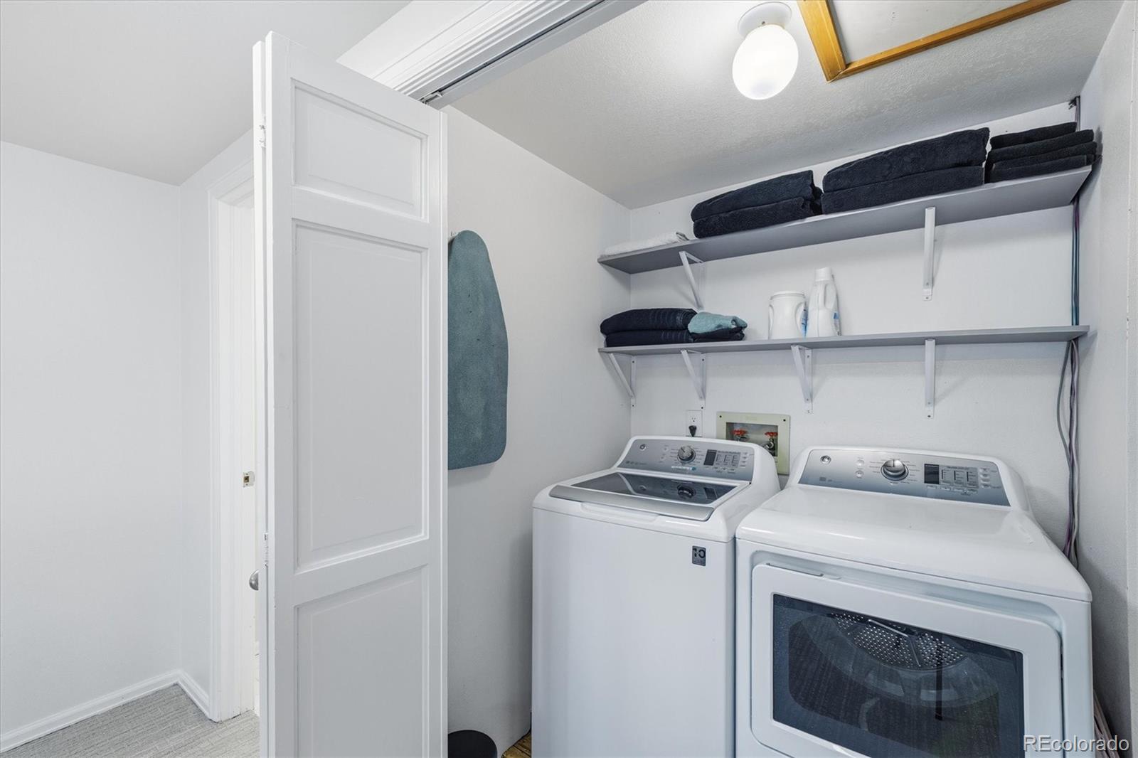 767 Ellis Street Golden, CO 80401 - Photo 33 of 50 a view of storage and utility room with washer and dryer