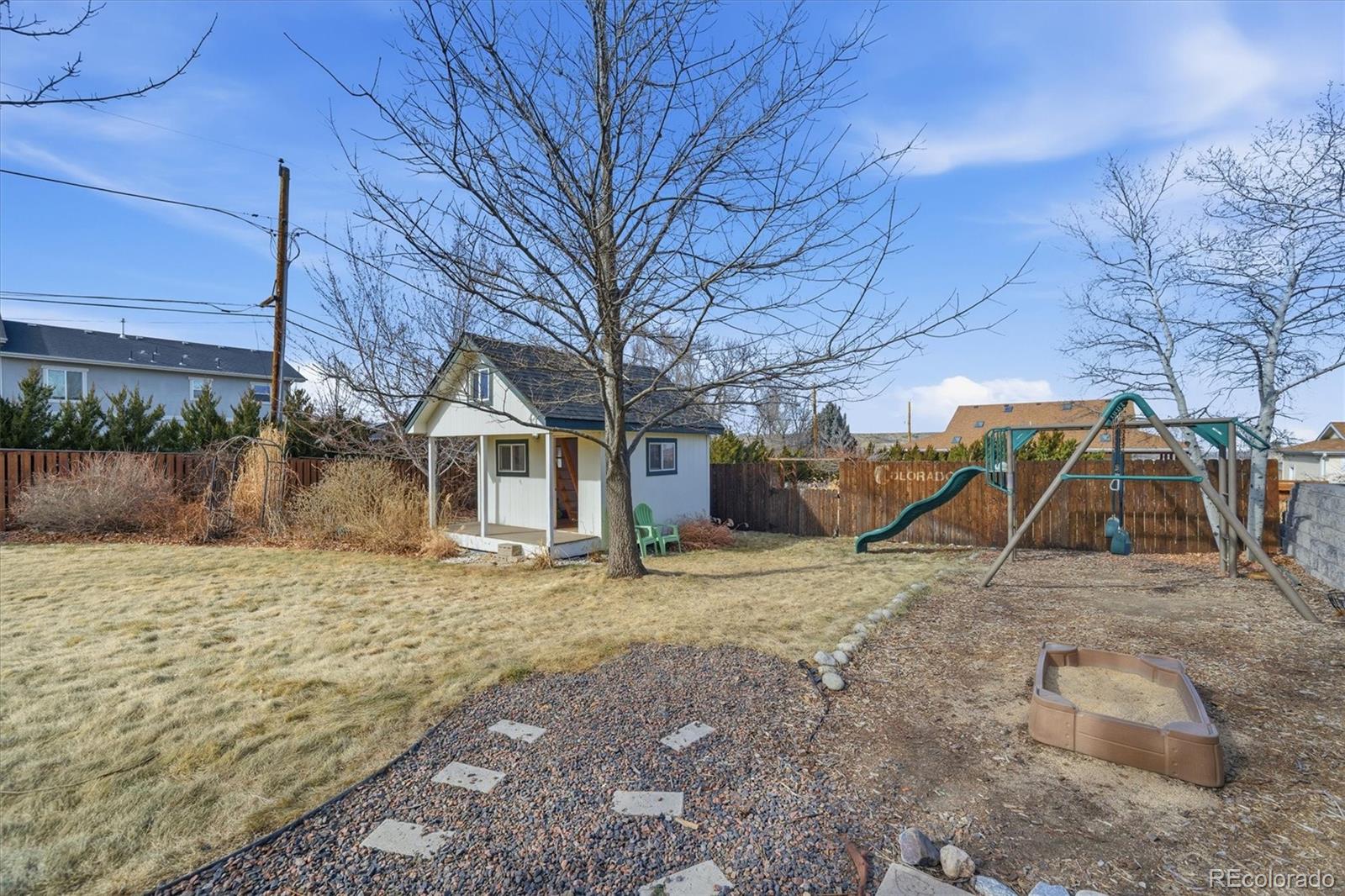 767 Ellis Street Golden, CO 80401 - Photo 43 of 50 a view of a house with a snow in the yard