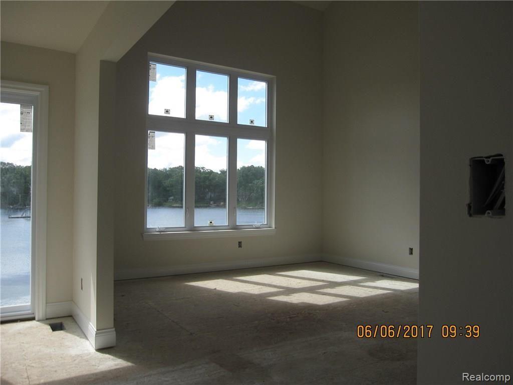 1456 Clark Lake Road Brighton, MI 48114 - Photo 6 of 17 Double Bank of Windows with a View!