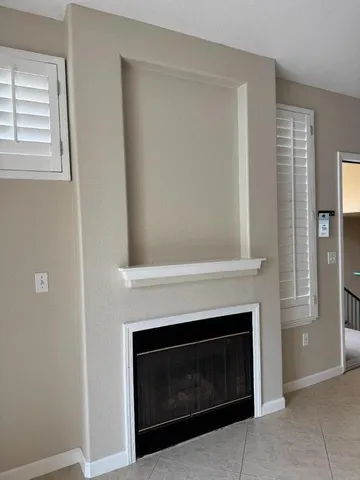 a view of balcony with furniture