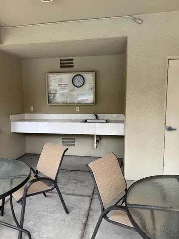 a view of a park with swings and slides