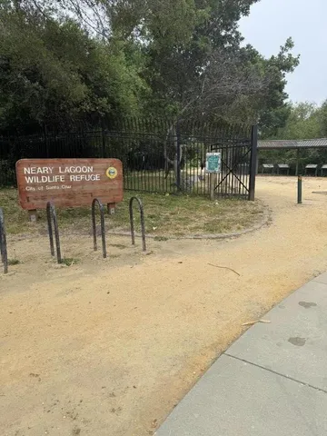 a group of people sitting outside of a building