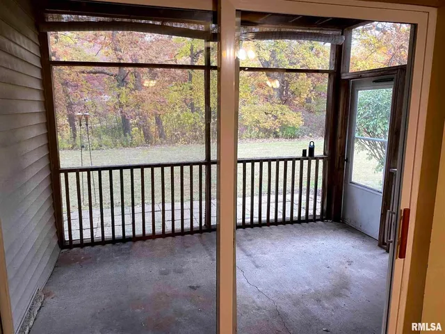 a view of a room with racks on the wall