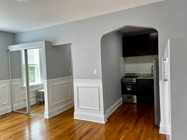 a view of livingroom with furniture and wooden floor