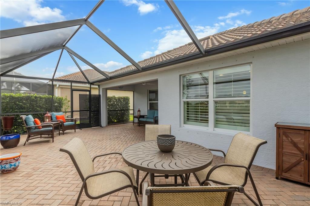 5801 Declaration Court Ave Maria, FL 34142 - Photo 25 of 38 a view of a house with sitting area and furniture
