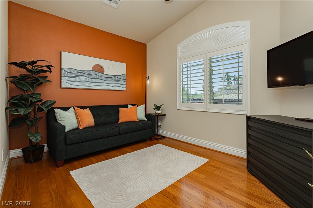 2256 Dogwood Ranch Avenue Henderson, NV 89052 - Photo 28 of 51 Hardwood flooring extends throughout this naturally illuminated study with a vaulted ceiling.