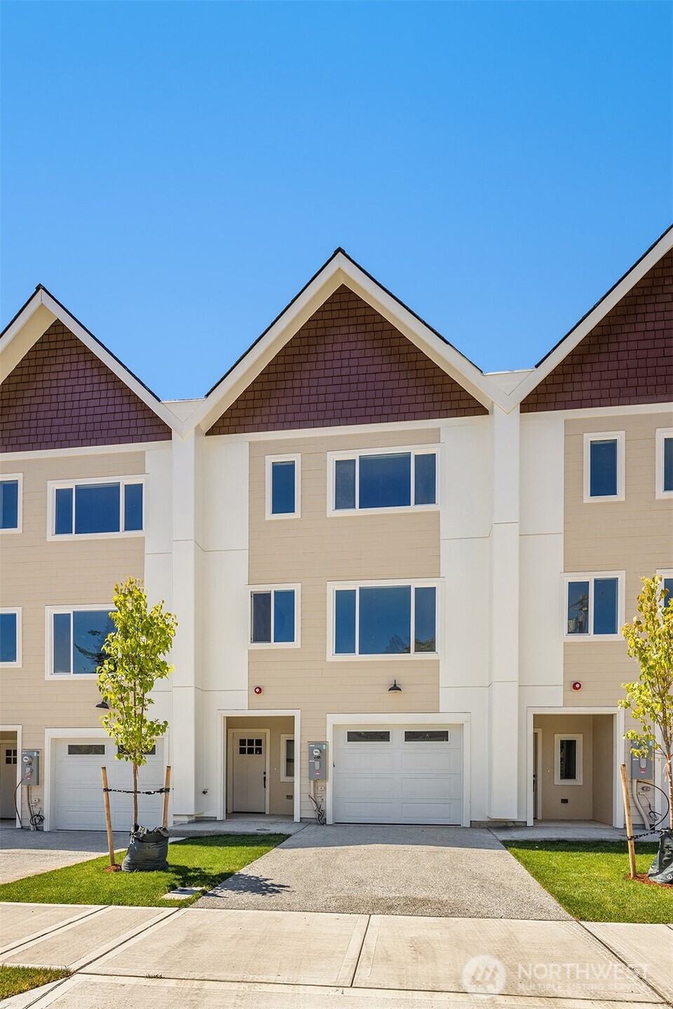 6618 52nd Avenue West University Place, WA 98467 - Photo 1 of 26 a front view of a house with a yard and garage
