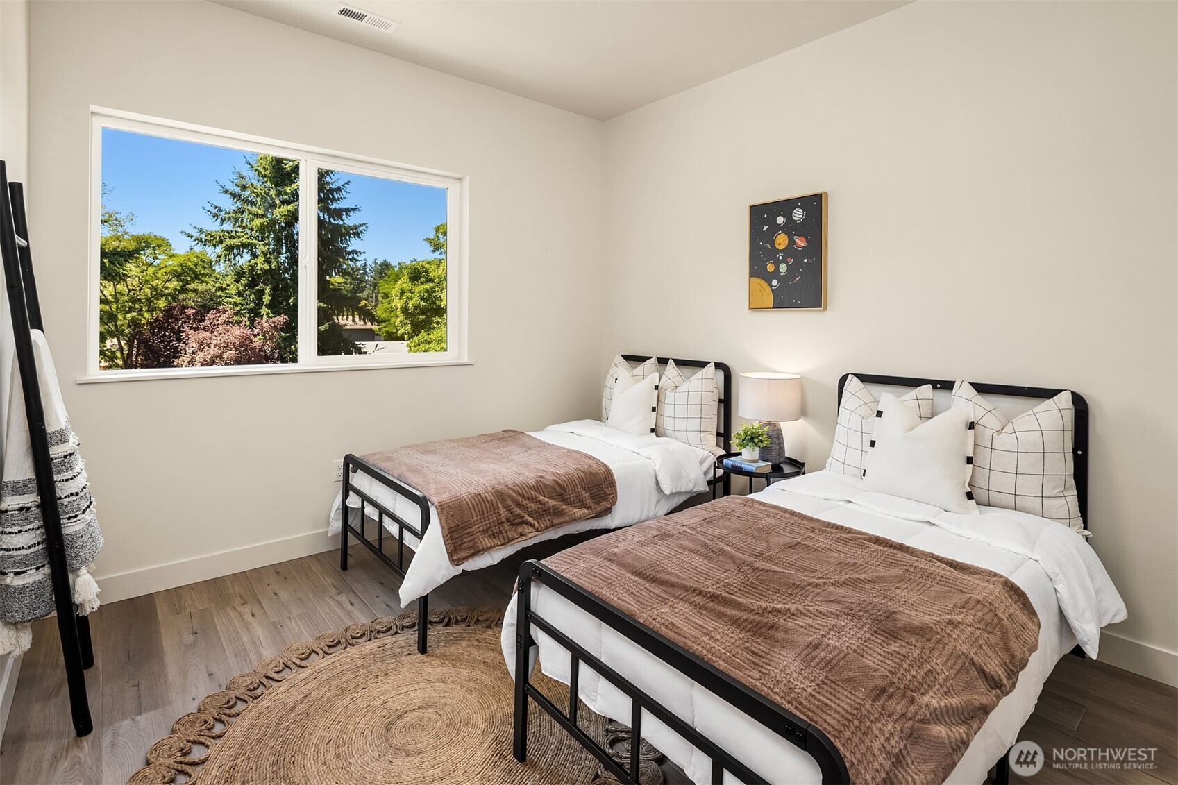 6618 52nd Avenue West University Place, WA 98467 - Photo 19 of 26 a bedroom with two beds and a window