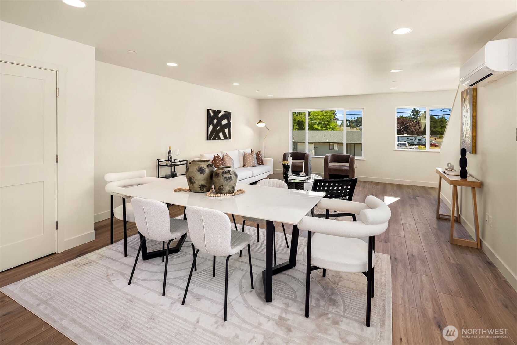 6618 52nd Avenue West University Place, WA 98467 - Photo 8 of 26 a view of a dining room with furniture window and wooden floor