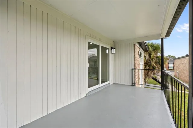 a view of a hallway with a stairs