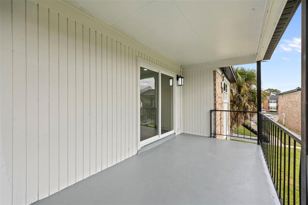 5317 Curry Ford Road, Unit 203 BLDG L Orlando, FL 32812 - Photo 13 of 18 a view of a hallway with a stairs