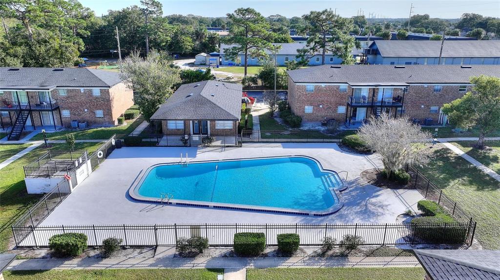 5317 Curry Ford Road, Unit 203 BLDG L Orlando, FL 32812 - Photo 15 of 18 an aerial view of a house with garden space and lake view