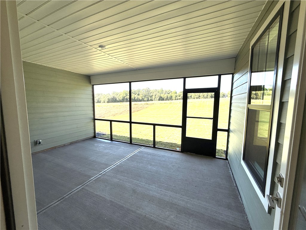 504 Tilman Court Anderson, SC 29621 - Photo 25 of 28 Enjoy tranquil views from this spacious screened-in porch, perfect for peaceful outdoor moments.