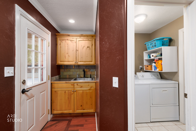 16535 South Redwood Road Riverton, UT 84065 - Photo 21 of 59 Laundry area with tile flooring and wall-mounted shelving