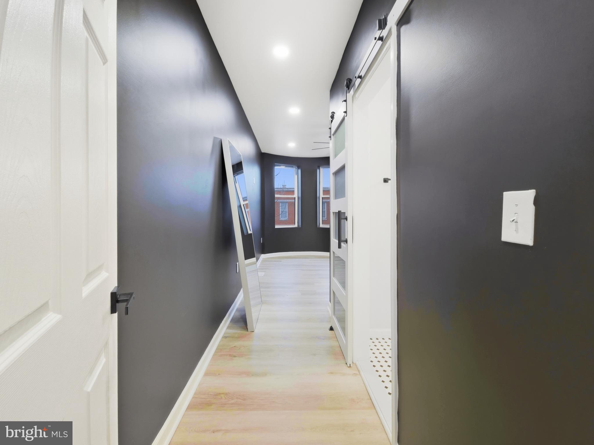 2321 McCulloh Street Baltimore, MD 21217 - Photo 11 of 29 a view of a hallway